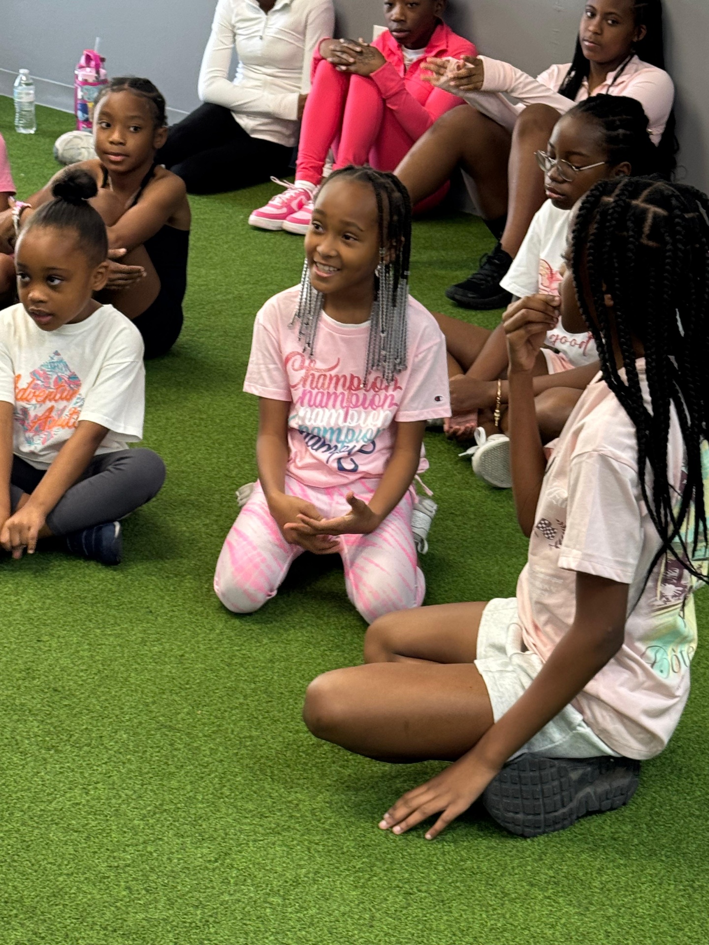 Girls sharing in a sisterhood circle outdoors