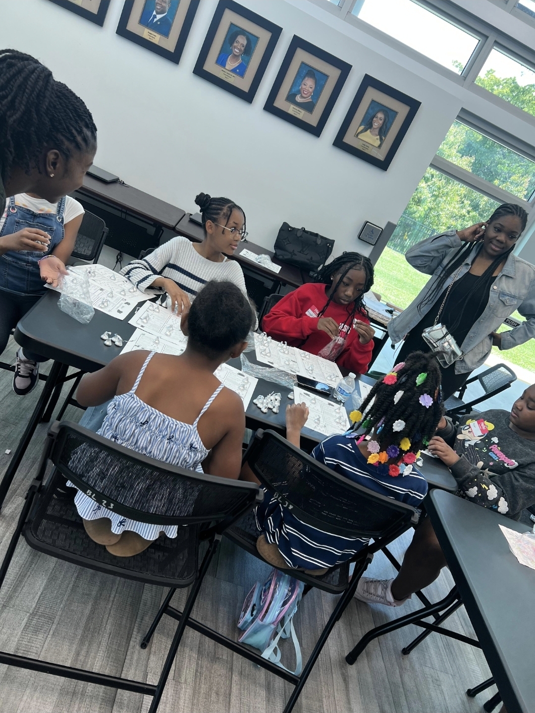 Girls working through a Bible activity together